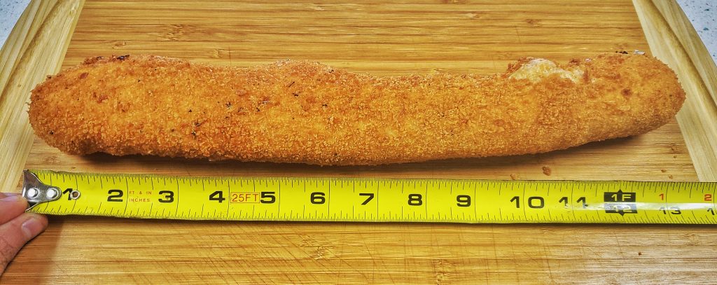 Biggest Taco Mozz Stick in the World - Frato's Schaumburg 2 El Masivo Gringo next to a tape measure showing 13 inches