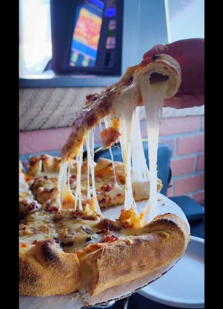 Pizza Cheese Pull at Frato's