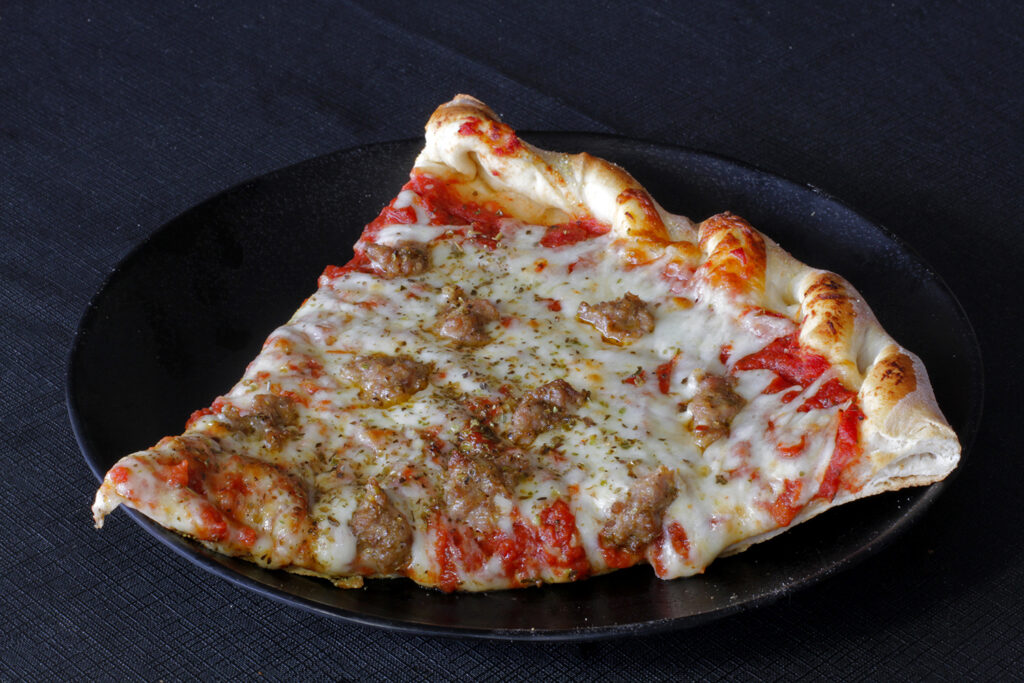 Frato's 1-pound Italian sausage pizza slice - Chicago-style with fennel sausage
