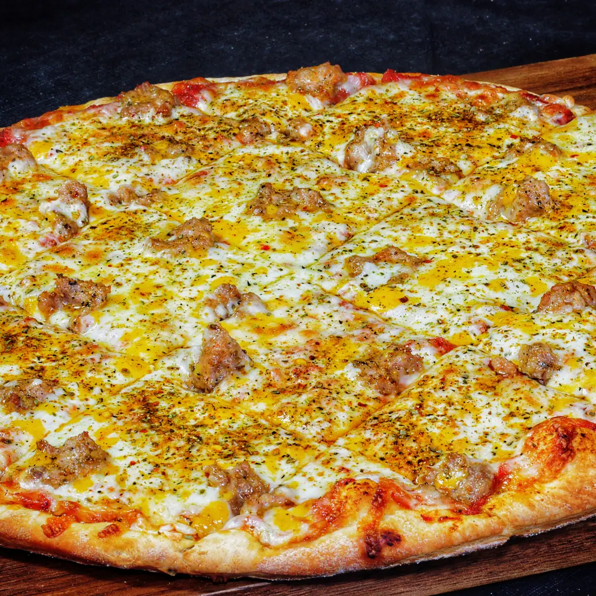 Frato’s square-cut Chicago thin crust pizza with sausage