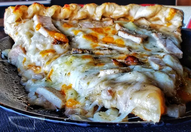 Frato’s Thanksgiving Turkey Pizza slice with gravy, mashed potatoes and roasted turkey in Schaumburg, IL