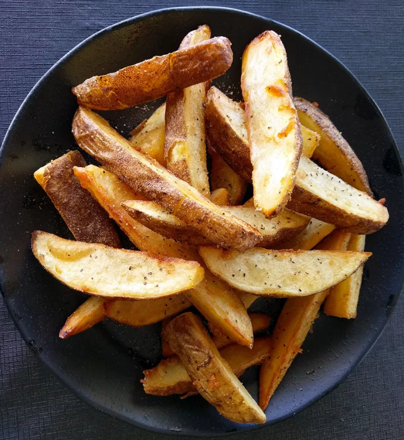 Wedge Fries in Schaumburg 1 A basket of Frato’s fresh-cut seasoned Idaho potato wedge fries