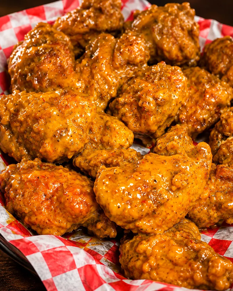 Frato’s Inferno Mustard boneless wings, made with ghost pepper, in a basket in Schaumburg, IL